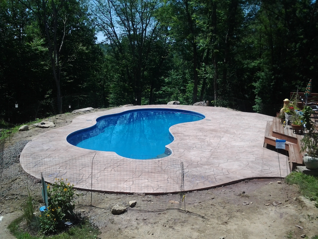 Swimming pool and stamped concrete project example 153